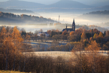 church in Lutowiska on a frosty autumn morning