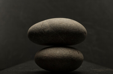 gray zen stone with shadow on dark gray background for podium background