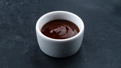 Teriyaki sauce in a small bowl.