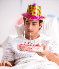 Young man celebrating his birthday in hospital
