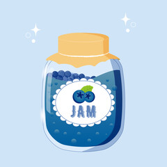 Natural organic blueberry jam in glass with tag and paper cover