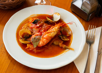 Seafood monkfish tail with shrimp and mussels. High quality photo