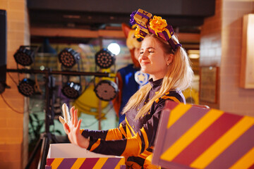 woman actor play at a children's party. 