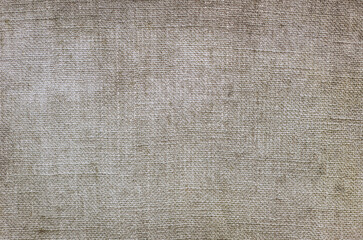 Background, texture of gray dirty stained burlap from woven fabric close-up. Photography, copy space.