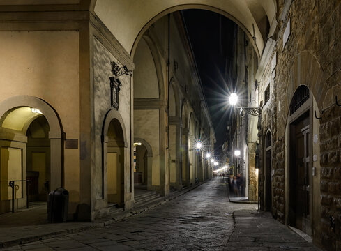 Cozy narrow street in Florence, Tuscany, Italy. Architecture and landmark of Florence. Night Florence cityscape