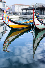 Traditional colorful boats for leisure tourists in the small town of Aveiro in Portugal