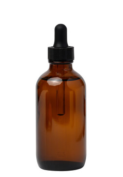 A glass brown bottle with a dropper on a white isolated background, a container for cosmetic products