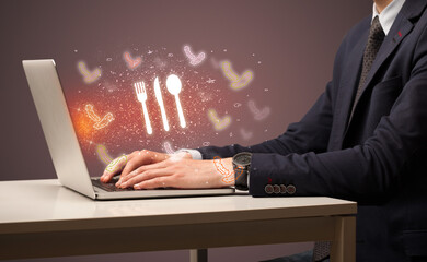 Hand searching for recipes on the internet