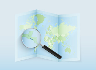 A folded world map with a magnifying lens pointing towards El Salvador. Map and flag of Italy in loupe.