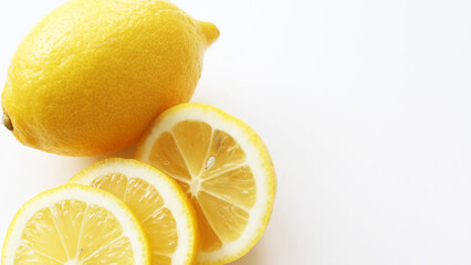 lemon and lemon slices on white background