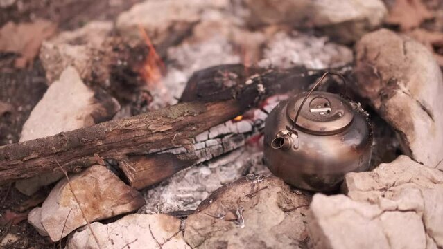Kettle in the camp fire