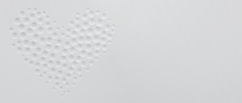 Abstract background in white colors with many concave small circles, arranged in a heart shape