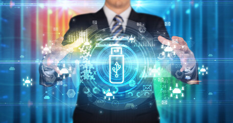 Businessman holding technology icon concept