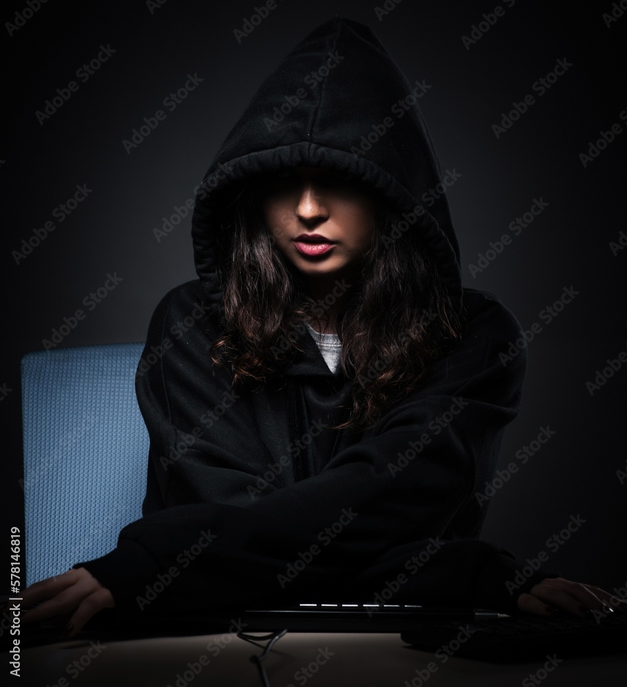 Poster female hacker hacking security firewall late in office