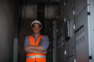 Electrician Doing Maintenance Of Electricity Fuse Box