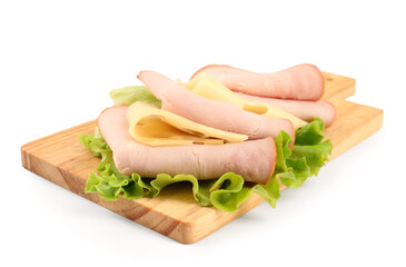 Board with slices of tasty ham, lettuce and cheese isolated on white background