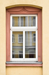 Fototapeta na wymiar View of old building with wooden window