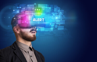Businessman looking through Virtual Reality glasses