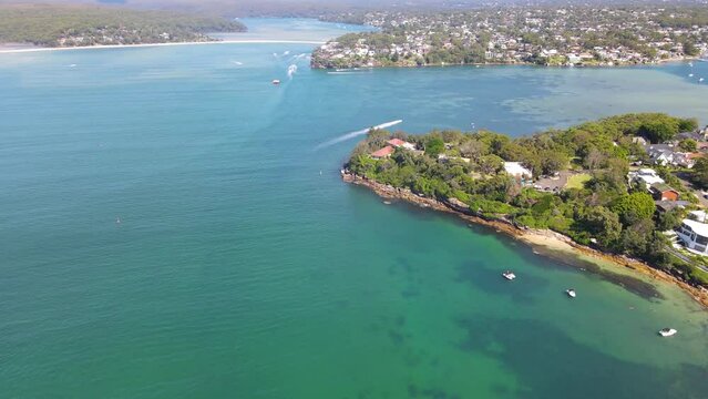 Aerial drone view of Port Hacking looking over Cronulla Peninsula toward Burraneer and Maianbar in the Sutherland Shire, Sydney NSW Australia during summer on a sunny day