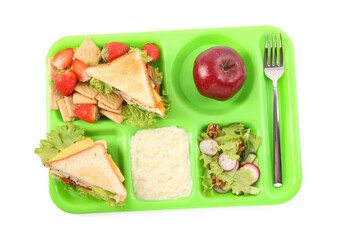 Serving tray of healthy food isolated on white, top view. School lunch