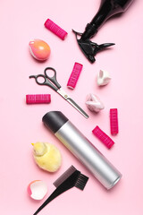 Hairdresser's tools with Easter rabbits and chicken on pink background