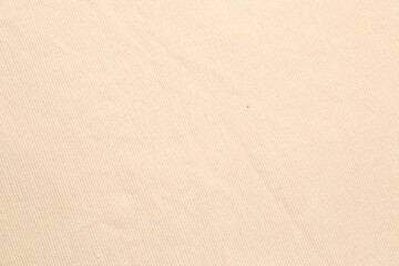 Fototapeta na wymiar Texture of beige fabric as background