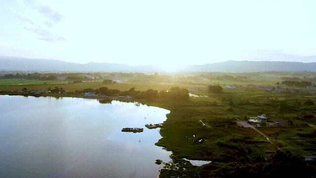 Morning view of Lake Toba at sunrise with rice fields and a very beautiful aerial view. Location on Bulbul Beach, Balige, Toba district. North Sumatra