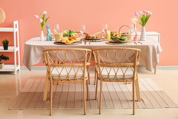 Interior of dining room with table served for Easter celebration