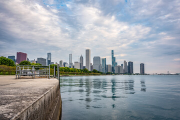 View of Chicago, Illinois skyline with Lake Michigan and clouds 