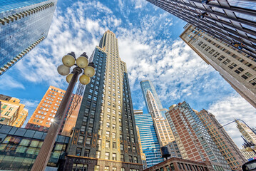View of Skyscraper Buildings and Sky with Clouds on Michigan Avenue in Downtown Chicago, Illinois.
