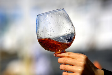 a glass of port wine in hand, portugal drink alcohol
