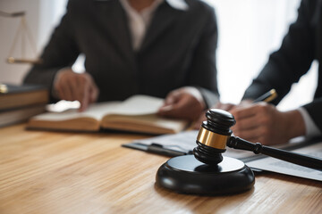 Lawyer, legal advisor, businessman brainstorming information on agreement details Business...