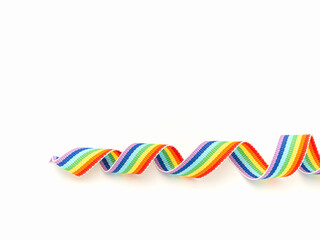 Rainbow cloth ribbon on a white background