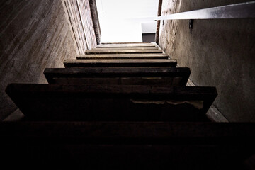 The stairs lead up from the dark basement to the light. The end of the quest, a special dark room...