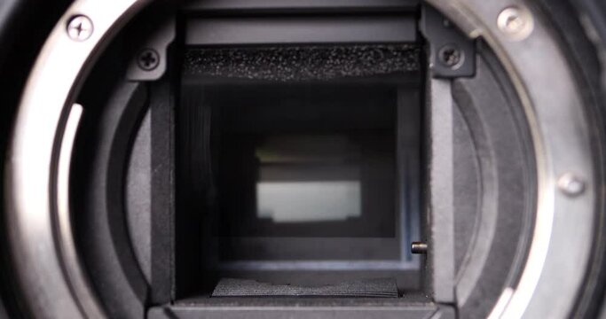 Close up of mirror and shutter mechanism digital camera.