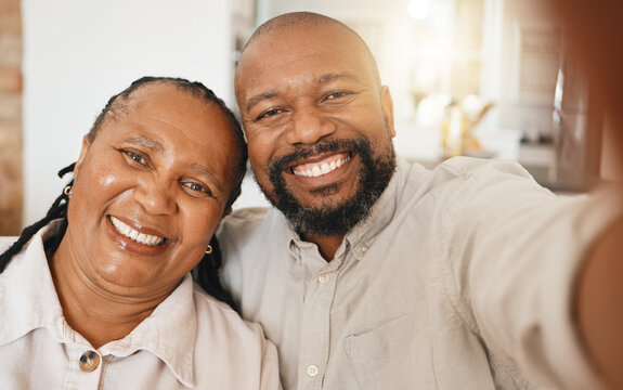 Smile, selfie and mature black couple in home with happiness and love in relationship together. Self portrait, happy face and man with woman taking romantic picture for social media in South Africa.