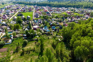 Country buildings surrounded by green nature from a bird's eye view