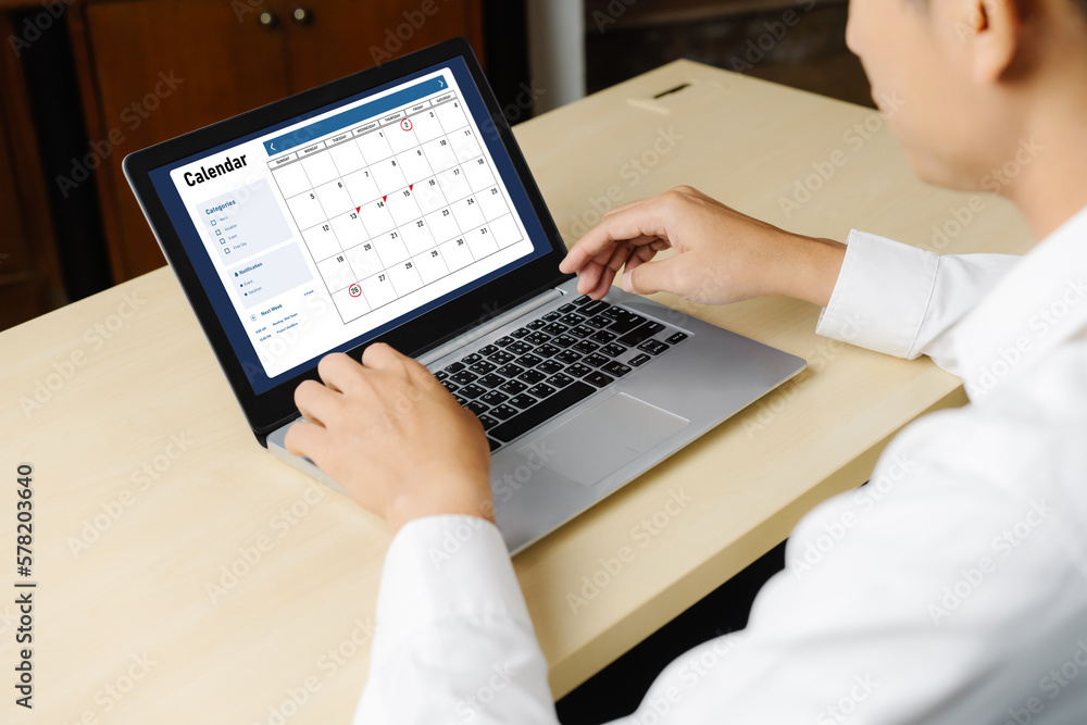 Poster calendar on computer software application for modish schedule planning for personal organizer and on