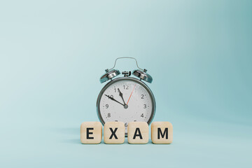 Conceptual background with an alarm clock on a desk for studying for a test. 3d rendering