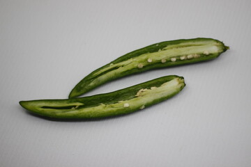 Photo big green chili isolated on a white background