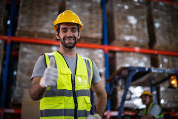 Caucasian male warehouse workers in warehouse distribution center environment.