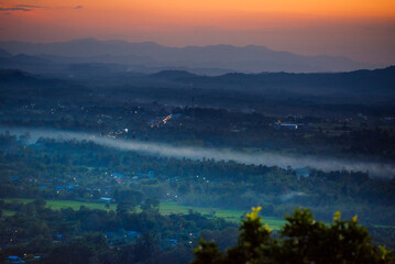 Sunset mountain range beautiful landscape mist, dusk golden time dramatic sky. Beautiful landscape high mountain ridge mist panning panorama scenery dawn dramatic sky. Sunrise landscape mountain peak.