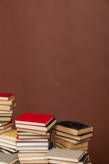 science a lot of books on a brown background reading in the library in the knowledge room