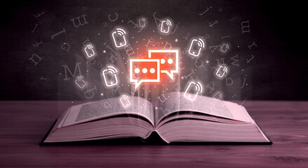 Open book with social networking icons above