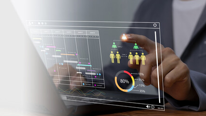 Analysts work with computers in management systems to create reports with KPIs and metrics...