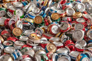 Background of crashed beer cans - recycling idea.
Compressed beer can background.