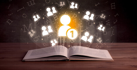Open book with social networking icons above