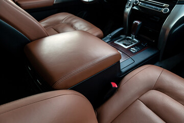 Armrest in the driver's car is upholstered in eco-leather. Beautiful leather car interior design....