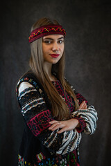 Portrait of  beautiful caucasian ukrainian young woman wear red embroidered dress, vyshyvanka