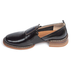 Black women leather office ankle boots with low heels on a white background